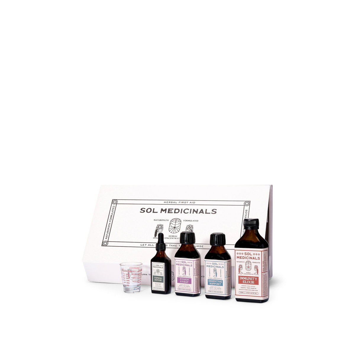 Sol Medicinals herbal potion kit featuring four amber glass bottles with vintage-style labels, a small clear measuring cup, and a white presentation box on a clean white background.